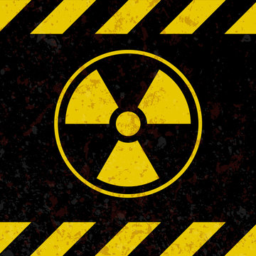 Sign of radiation. A plate in the style of grunge. Vector illustration