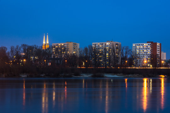 Night view on the Praga district and Vistula river in Warsaw, Poland
