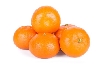 Group of ripe fresh juicy tangerines or mandarines isolated on white background