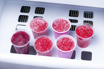 Frozen fruit puree in the freezer
