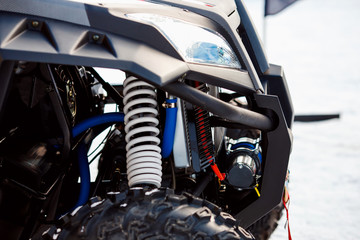 Fototapeta premium Atv Quad bike, close-up of details: headlights, shock absorber.