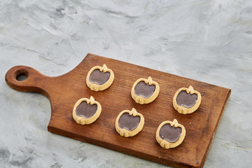 Top view close-up picture of tasty cookies on the cutting board, shallow depth of field, selective focus