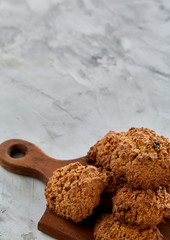 Top view close-up picture of tasty cookies on the cutting board, shallow depth of field, selective focus