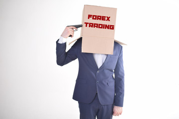 The businessman is holding a box with the inscription:FOREX TRADING