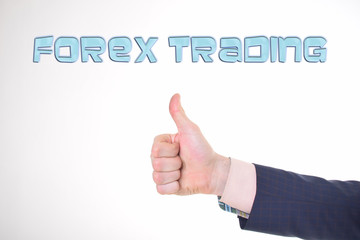 A businessman shows an inscription:FOREX TRADING