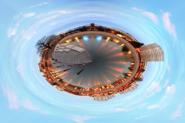 Panorama 360 stopni wierzowca, oświetlenie nocą, w stylu mini planety.
