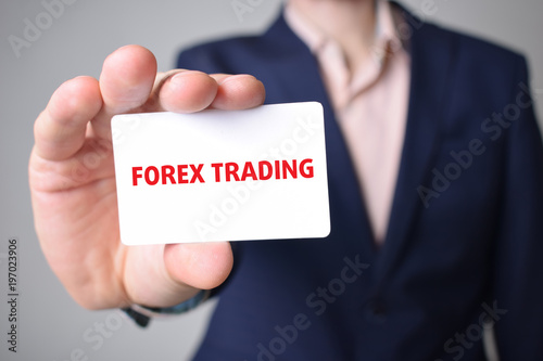 Businessman Shows Business Card With The Inscription Forex Trading - 
