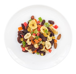 Dried fruits in plate isolated on white