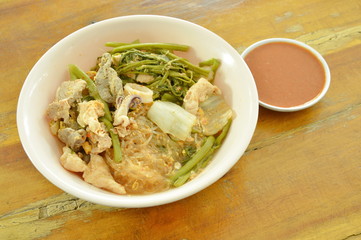 boiled seafood sukiyaki in soup with sauce