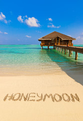 Word Honeymoon on beach