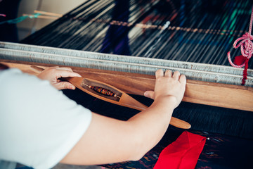 Silk weaving or Knitting silk cotton on the manual wood loom for homemade silk or textile...