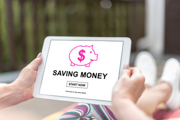 Saving money concept on a tablet