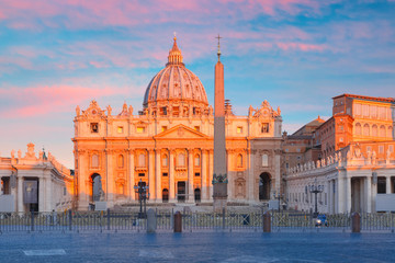 Panoramic view of The Papal Basilica of St. Peter in the Vatican or Saint Peter Cathedral at sunrise in Rome, Italy.
