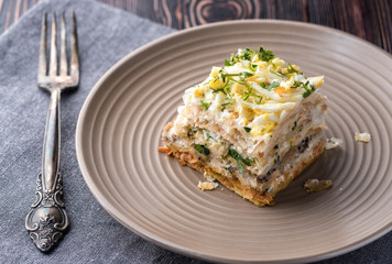 Fish pie with a dough, egg and fresh herbs