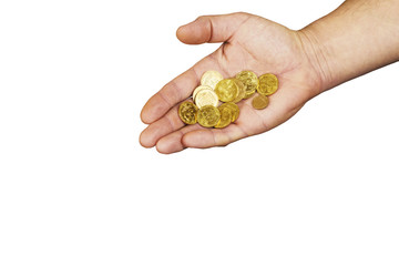 A handful of coins in the palm of a hand
