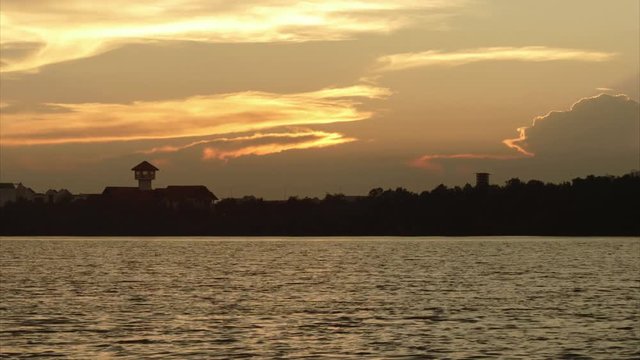Time-Lapse sunset Bang Pakong River, Chachoengsao, late March, Thailand's spring.