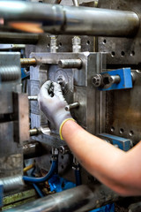 Fototapeta premium Man working on metalworking machine
