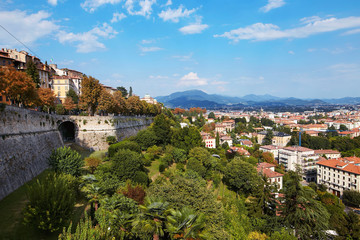 Fototapeta na wymiar Bergamo, Italy - August 18, 2017: Panoramic view of the city of Bergamo from the castle walls
