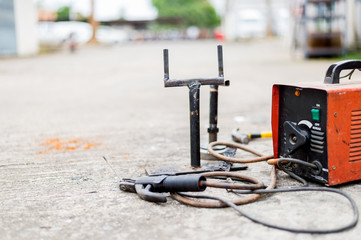 welding machine equipment with workplace. soft-focus and over light in the background