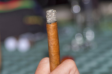 Cuban cigar is twisted by the hands of tobacco leaves, fragrant 