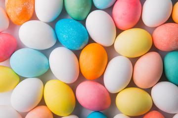Eggs flat lay on a white background. Easter and spring composition.