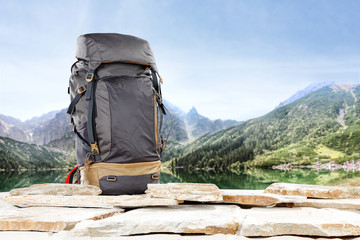 Fototapeta backpack and mountains  obraz