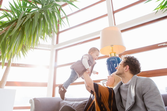 Cheerful family on couch