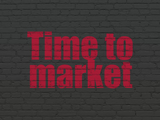 Timeline concept: Painted red text Time to Market on Black Brick wall background