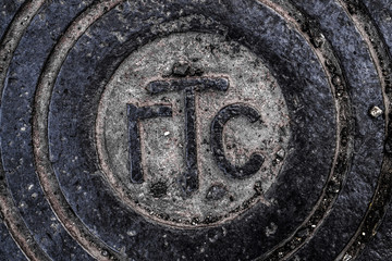 Manhole cover. Water manhole cover. Metal background. Rusty grunge manhole cover