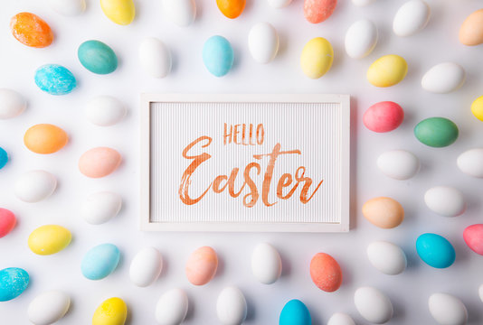 Hello Easter flat lay on a white background.