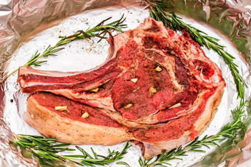 Close up seasoned beef steak stuffed with garlic