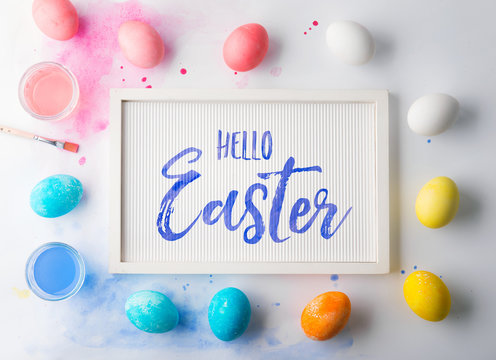 Hello Easter flat lay on a white background.