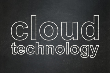Cloud computing concept: text Cloud Technology on Black chalkboard background