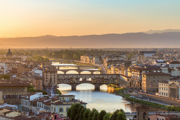 Fototapeta na wymiar City of Florence at sunset with the Ponte Vecchio bridge