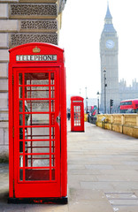 Red telephone box and Big Ben in London.