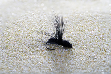 Artificial fly for fishing for trout and other predators 
