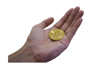 Bitcoin in gold color on man's hand and isolated white background, with clipping path