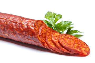 Spanish chorizo sausage on white background