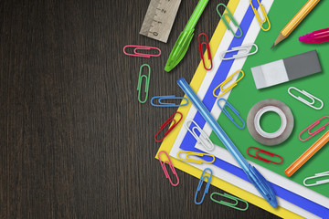 Stationery colorful pens, pencils, paper clip, color paper.