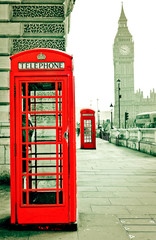 Red telephone box and Big Ben in London with vintage and isolated effect.