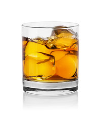 Glass with whiskey and ice cubes
