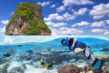Man at snorkeling in the tropical water