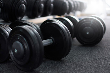 Closeup of dumbbells in the gym. Sports Equipment