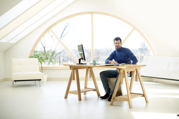 Young man working from home
