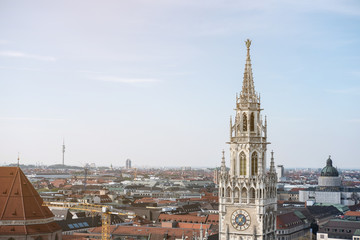 Fototapeta na wymiar Aerial view of Munich, Germany with Rathaus-Glockenspiel on foreground