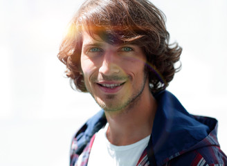 portrait. stylish guy in a plaid shirt. close-up.