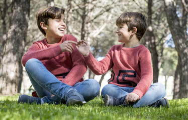 brothers together in the park