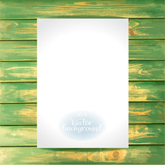 Empty paper on the wooden vintage background