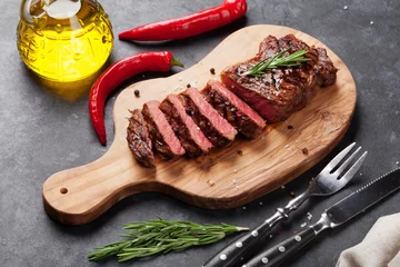 Zelfklevend Fotobehang Grilled sliced beef steak © karandaev