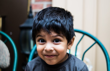 Young latino boy smiling